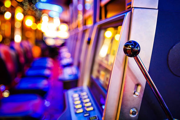 Mobile phone showing tarkamtoto Dream Gaming interface and live table selection